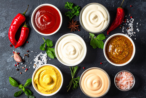 Multiple packets of Heinz ketchup demonstrate RubeeFlex's approach to brand packaging